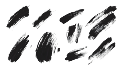 Isolated black brush strokes on a black background creating an abstract artistic design element