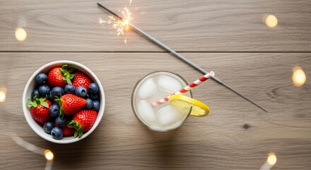 Festive Fourth of July flat lay with American flag, sparkler, and berries. Top view of patriotic summer celebration on rustic wood. Perfect for Independence Day, Memorial Day, or Labor Day themes.