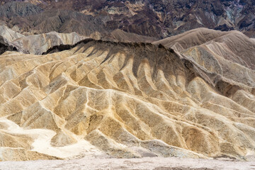 View of Zabriskie Point in Death Valley National Park in California, United States. Zabriskie Point is a part of the Amargosa Range located east of Death Valley noted for its erosional landscape. © JHVEPhoto