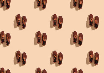 Casual male shoes on color background