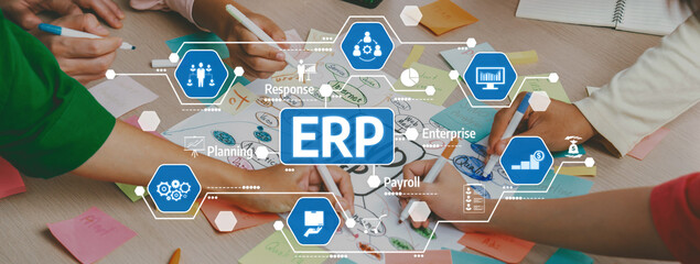 A vibrant and interactive workspace showcasing teamwork in planning and strategy development with a focus on ERP concepts, highlighting engagement and creativity. Amity