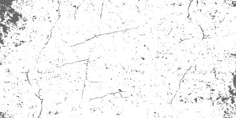 Grunge wall texture with old white paint and black dirt splash forming a pattern for design backdrop