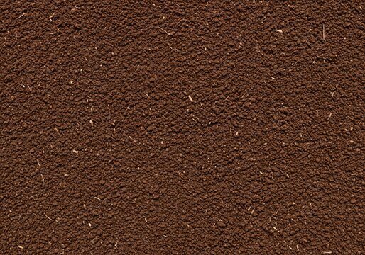 Seamless repeating texture of rich dark brown organic soil and finely sifted compost