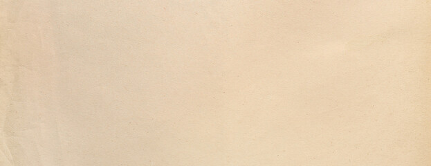 Texture of beige paper sheet, closeup