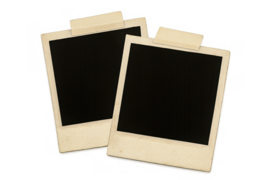 Blank instant camera frames with tape providing space for custom images, bringing back vintage memories