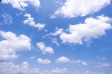 Naklejka premium clear blue sky background,clouds with background, Blue sky background with tiny clouds. White fluffy clouds in the blue sky. 