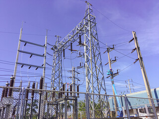 Maintenance service for high-voltage distribution systems, Electricity substation with blue sky backgound