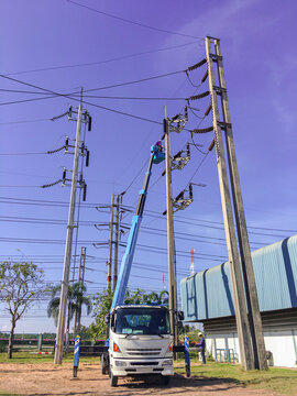 Maintenance service for high-voltage distribution systems, Electricity substation with blue sky backgound