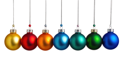 Vivid, rainbow-hued holiday ornaments hang in a neat line against a stark black background, creating a festive display