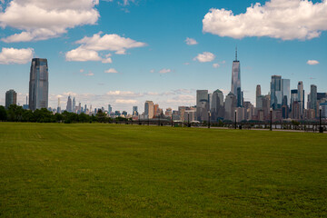 Obraz premium NYC, New York City Skyline with dramatic sky clouds. New York Skyscrapers. New York City skyline, cityscape of Manhattan in USA. Panoramic view on Manhattan. New York skyline. NYC, NY city.