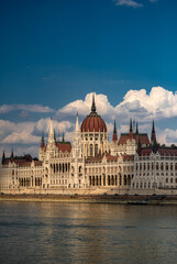 Obraz premium Hungarian Parliament Building on Danube River in Budapest. Budapest Parliament with reflection in water. Iconic Hungarian landmark. Budapest cityscape with Parliament.