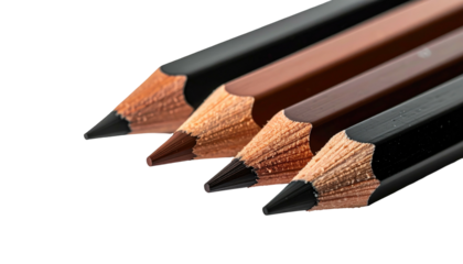Four sharpened pencils in varying dark hues lie diagonally against a stark black background