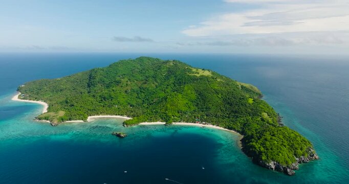 Panorama view of Cobrador Island with beaches surrounded by blue sea. Romblon, Philippines.