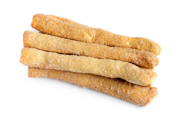 A pile of breadstick cookies on a white background. Sweet breadsticks isolated