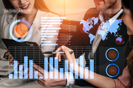 A dynamic business meeting showcasing a dashboard filled with data visualizations and graphs. Professionals analyze statistics on a tablet, emphasizing collaboration and strategy. Impute - Powered by Adobe