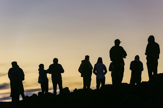 Sunset. "Puʻuʻulaʻula" (Red Hill) is the summit of Haleakalā on Maui, Hawaii. A sea of clouds is an overcast layer of stratocumulus clouds. Haleakalā National Park - Powered by Adobe