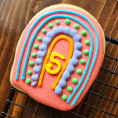 Bright and Colorful Rainbow Cookie with Vibrant Icing