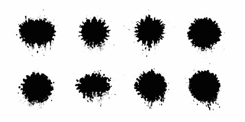 Collection of eight black ink splatter brush strokes on a white background