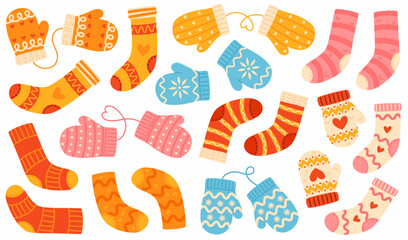 Set of knitted socks and mittens with patterns.