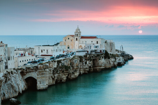 Sunrise over old town of Vieste, Gargano, Puglia, Italy