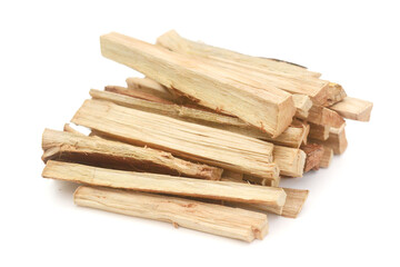 A stack of split firewood on a white background