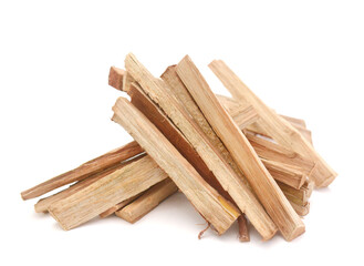 A stack of split firewood on a white background