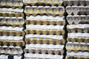 Egg cartons stacked in a warehouse ready for distribution