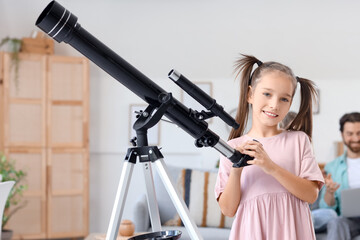 Little girl with telescope and her parents at home