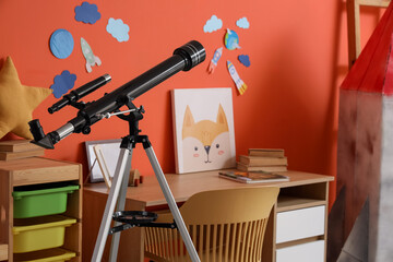 Fototapeta premium Interior of stylish children's room with table, toys and modern telescope