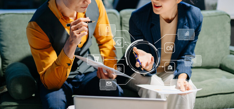 Working team meeting concept, business using laptop and smart phone and digital tablet computer with digital marketing media  in virtual icon network diagram office