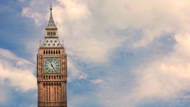 Dynamic hyperlapse of the Elizabeth Tower, showcasing the iconic Big Ben clock face framed by drifting clouds in a bright London sky, symbolizing time, heritage, and urban grandeur.