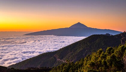 A scenic panorama capturing a volcanic mountain peak silhouetted against a vibrant sunset sky above a sea of clouds