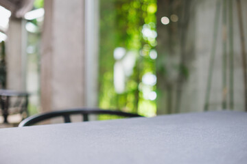 A table and chair in cafe with blurred background