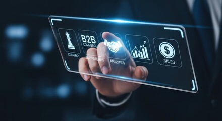 Businessman hand touching glowing digital handshake icon on virtual B2B commerce interface for partnership strategy concept