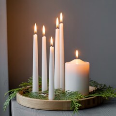 Warm and elegant holiday centerpiece with multiple lit white can