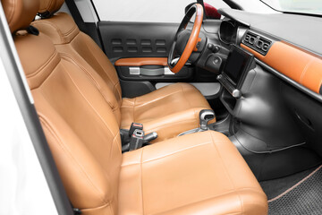 View of modern car with brown leather seats and dashboard