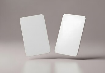 Two blank white cards floating in front of a neutral background, ready for customization or design