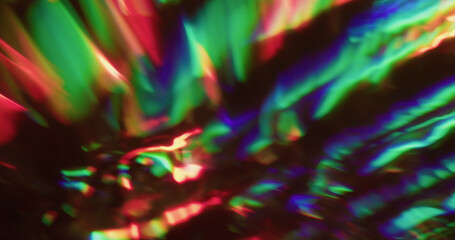 Holographic light blur. Beam prism. Rainbow color twinkle rays stream on black. Gradient neon reflection lens abstract background.