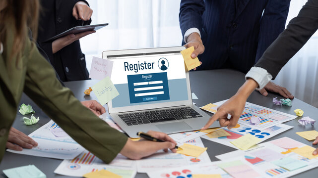 Analyst team use sticky note for creative and analytic brainstorm for business idea with BI data dashboard on laptop screen. Analysis financial data visualization tech for marketing strategy. Prodigy