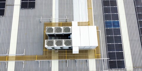 Solar panels installation on industrial warehouse roof