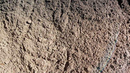 Natural dry soil texture background with cracked rough earth surface and organic ground detail for geology and design use