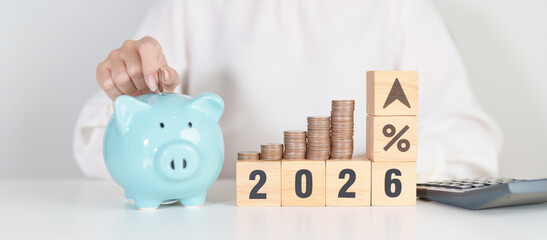 2026 New year with percentage change to UP and Down arrow with coin stack. Interest rate, GDP, stocks market, financial, deflation and Inflation, mortgage, debt, Loan and Economic Recession