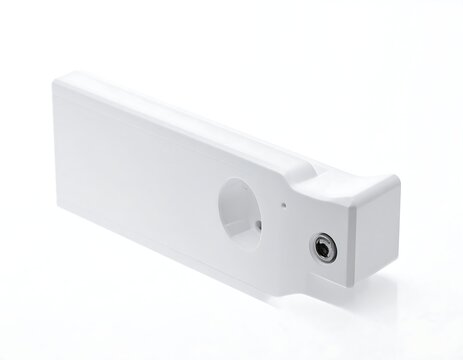 White, rectangular electronic device with a socket and a circular port