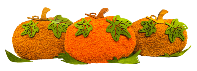 Three orange and brown felt pumpkin decorations isolated on transparent background