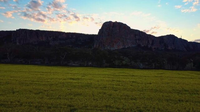 Flying Over Conola Field Toward Rocky Cliff Face, Aerial Fly Over, Mt Arapiles