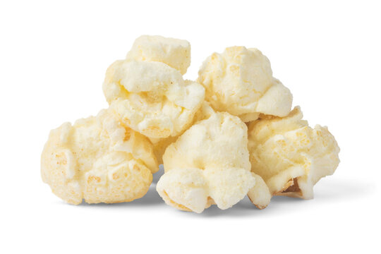 Pile of fluffy white cheddar jalapeno popcorn kernels on white snack food