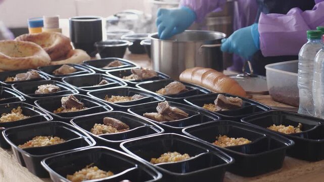 Volunteers helping the needy with food donations during holiday