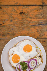 Chilaquiles verdes con huevo frito