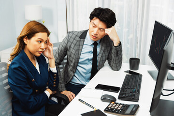 Stressful exchange investing business partners discussing in loss profit stock exchange rate investment missing trade value dynamic complication on financial application in recession stage. Infobahn.