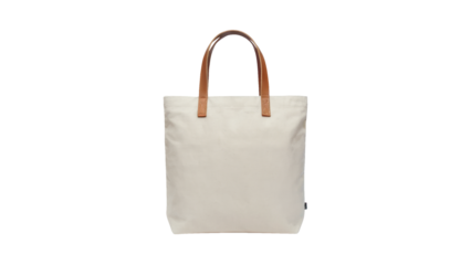 Stylish reusable canvas tote bag with leather handles for eco-friendly shopping and everyday carry, perfect for branding mockups and sustainable living Isolated on white or transparent PNG.